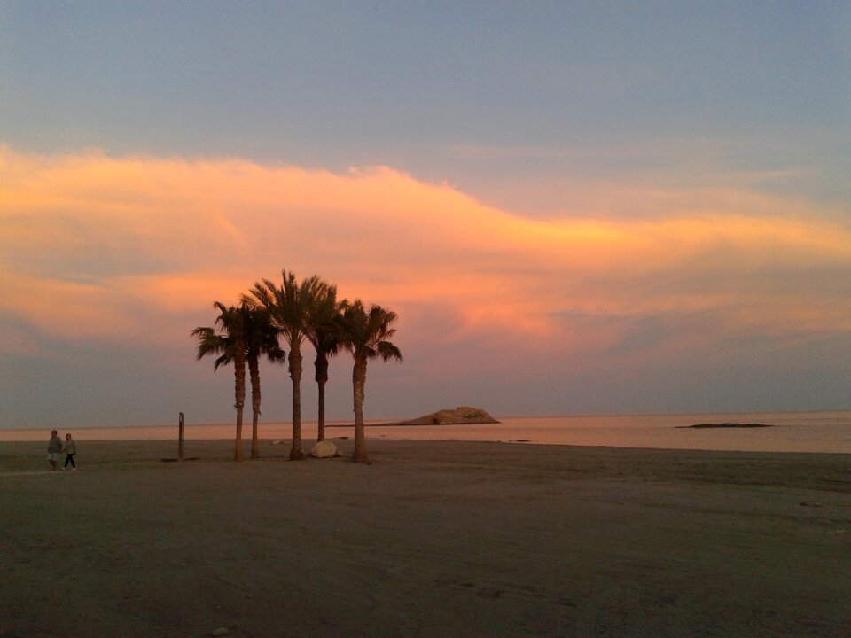 Beach backlight clouds