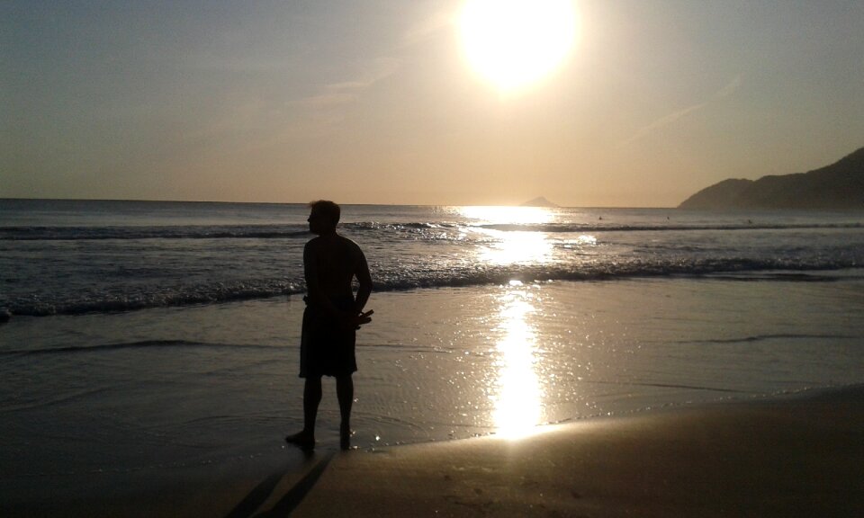 Reflection by sunsets beach