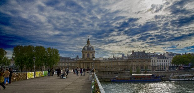 Paris bridge water clouds