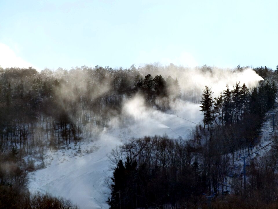 Snow machine mountain trees landscape
