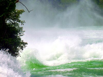 Roaring foaming water mass photo