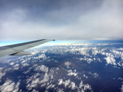 Clouds flying plane