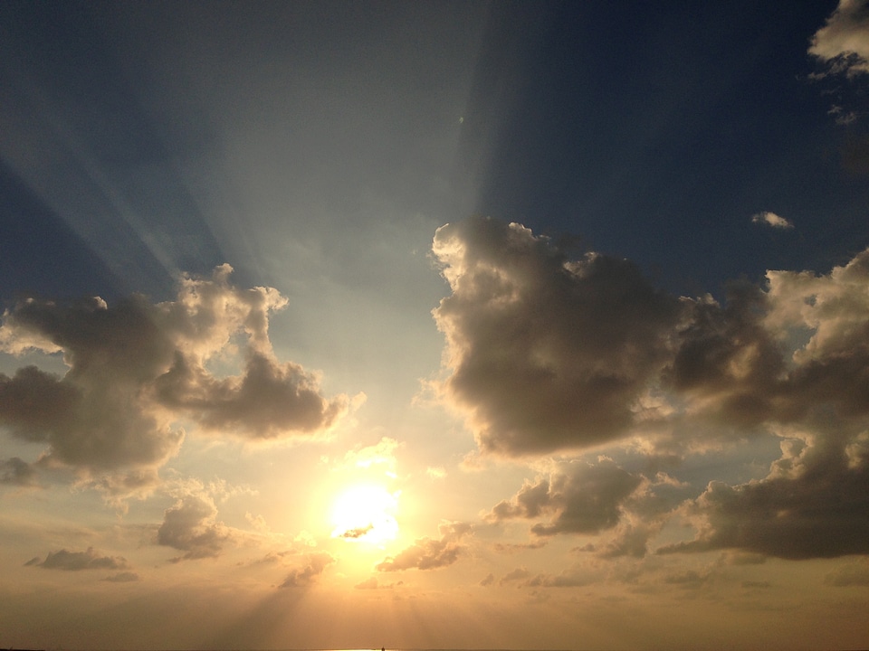 Sun clouds sunbeam