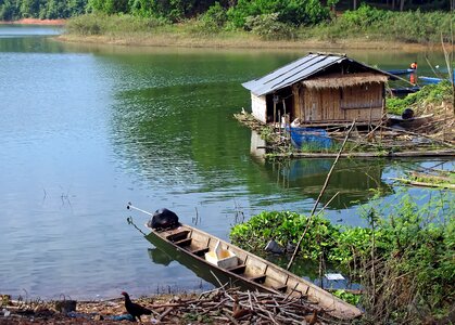 Fisherman reflections vang vieng photo