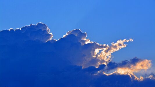 Blue clouds form covered sky photo