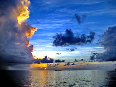 Sea sun clouds
