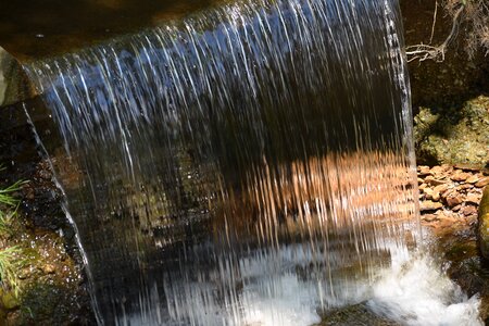 Flow stone brown waterfall photo