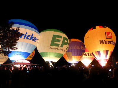 Hot air balloons glow night