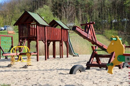 Swing jungle gym sand
