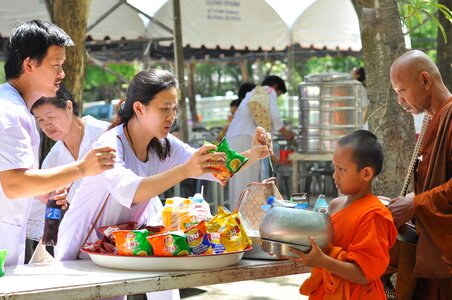 Buddhists thailand alms photo