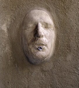 Rock carving stone head photo