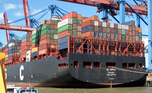 Container ship trade in goods container handling photo