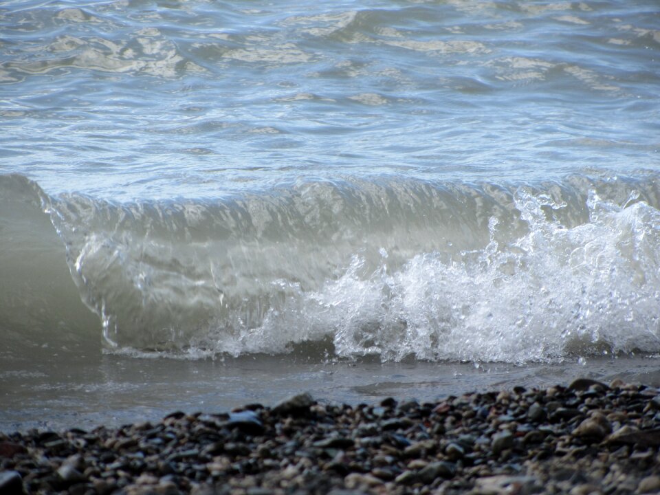 Beach stones wave