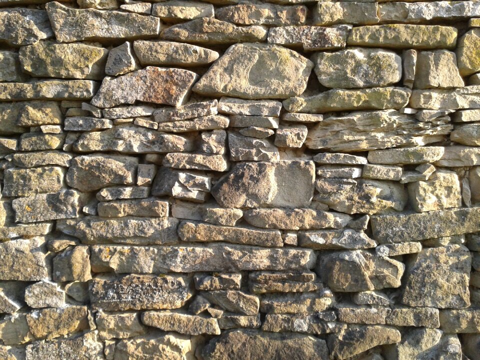 Stones wall sun