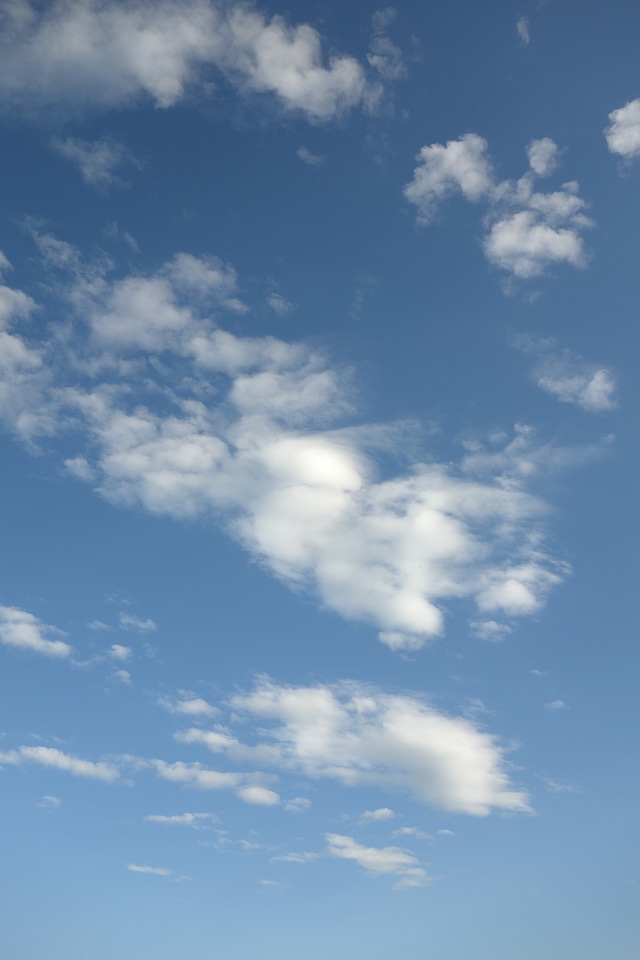 White fleecy cloud landscape