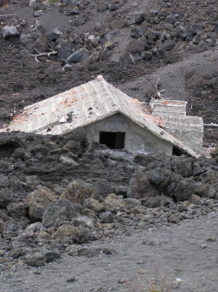 Lava submerged house