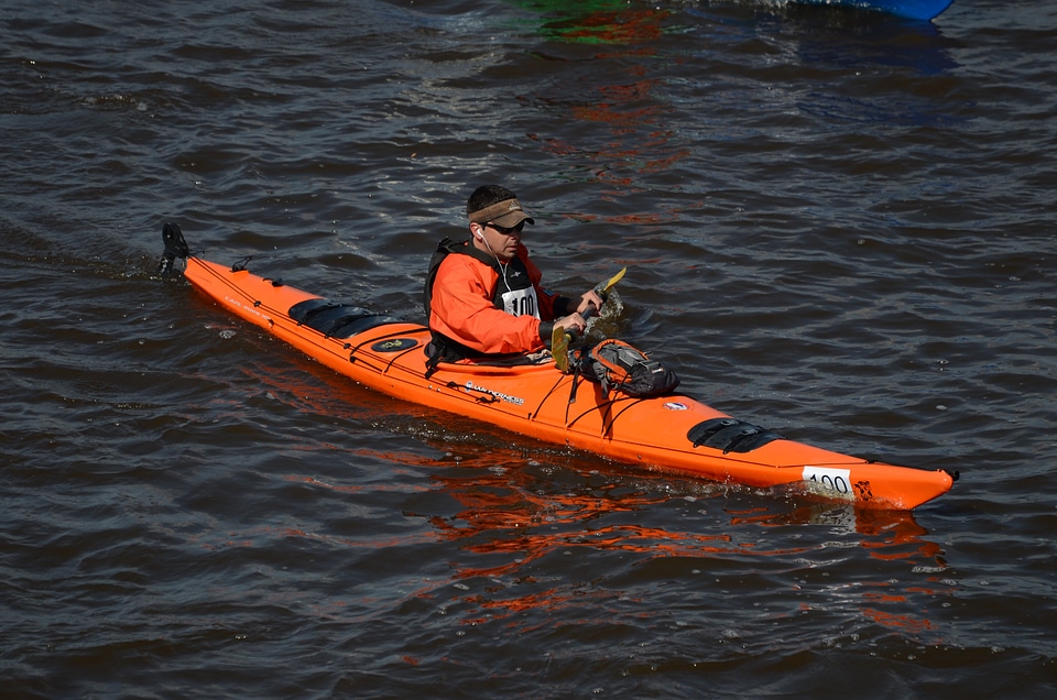 Man boat adventure photo