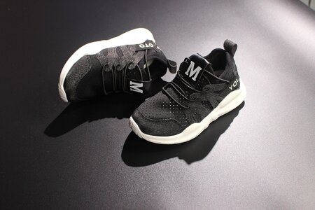 Sports shoes breathable black background photo
