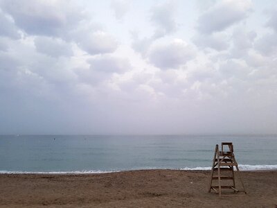 Beach clouds horizon photo