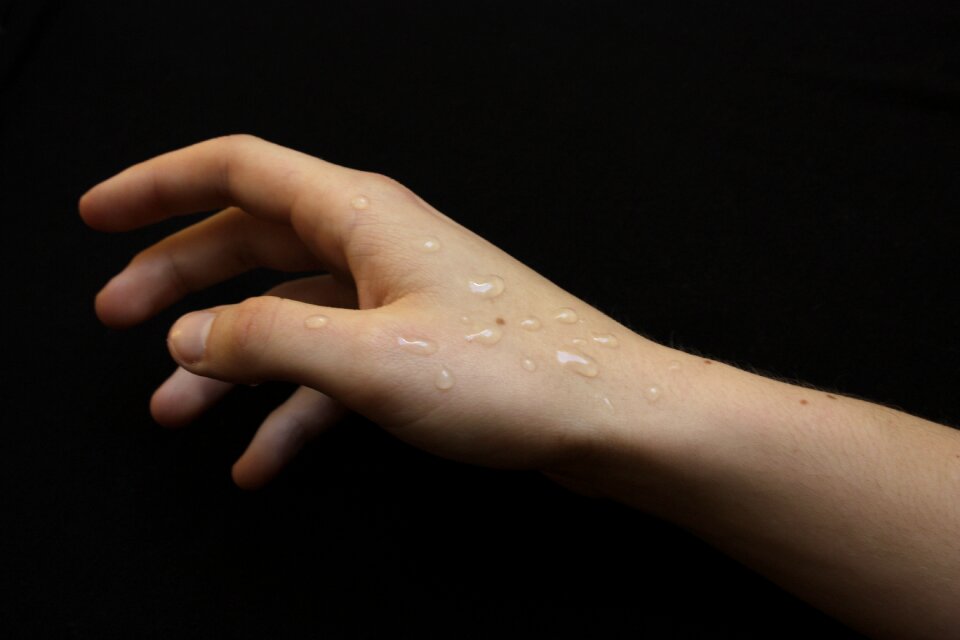 El black background official hand