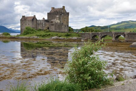 Castle mirroring eilean donan castle