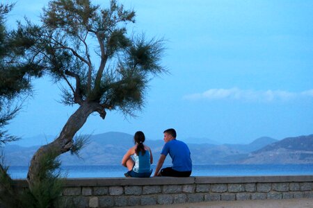 Seaside young couple romantic photo