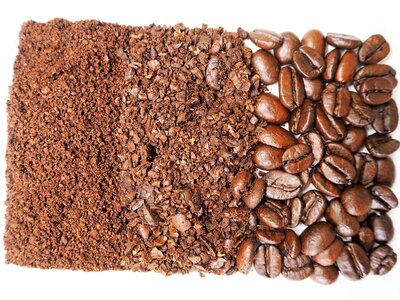 Whole bean coffee ground background photo