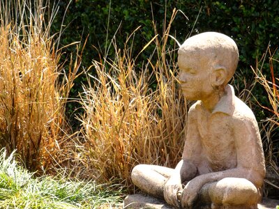 Child figure seated