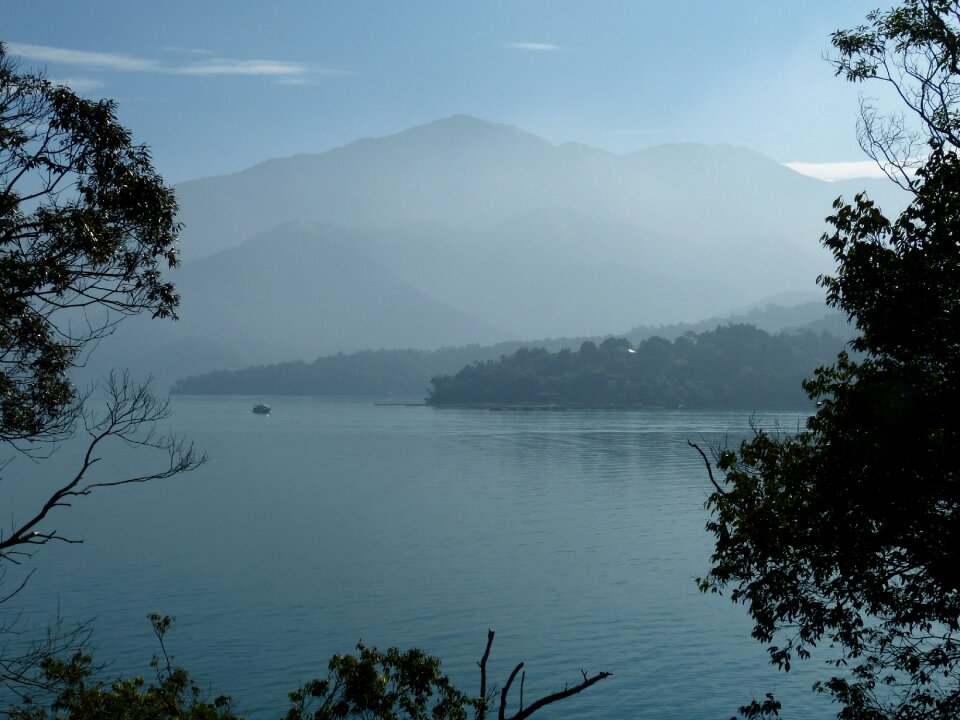 Lake haze mountains
