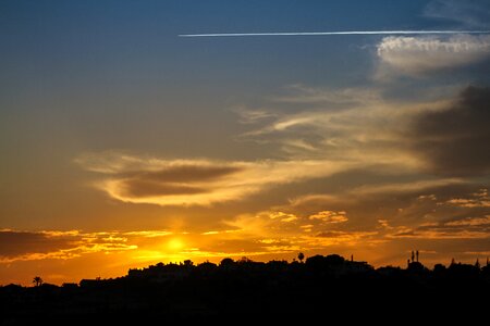 The setting sun cloud landscape photo