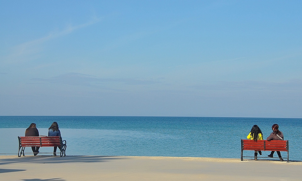 Sitting couple beach