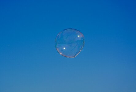 Soap bubble transparency blue sky photo