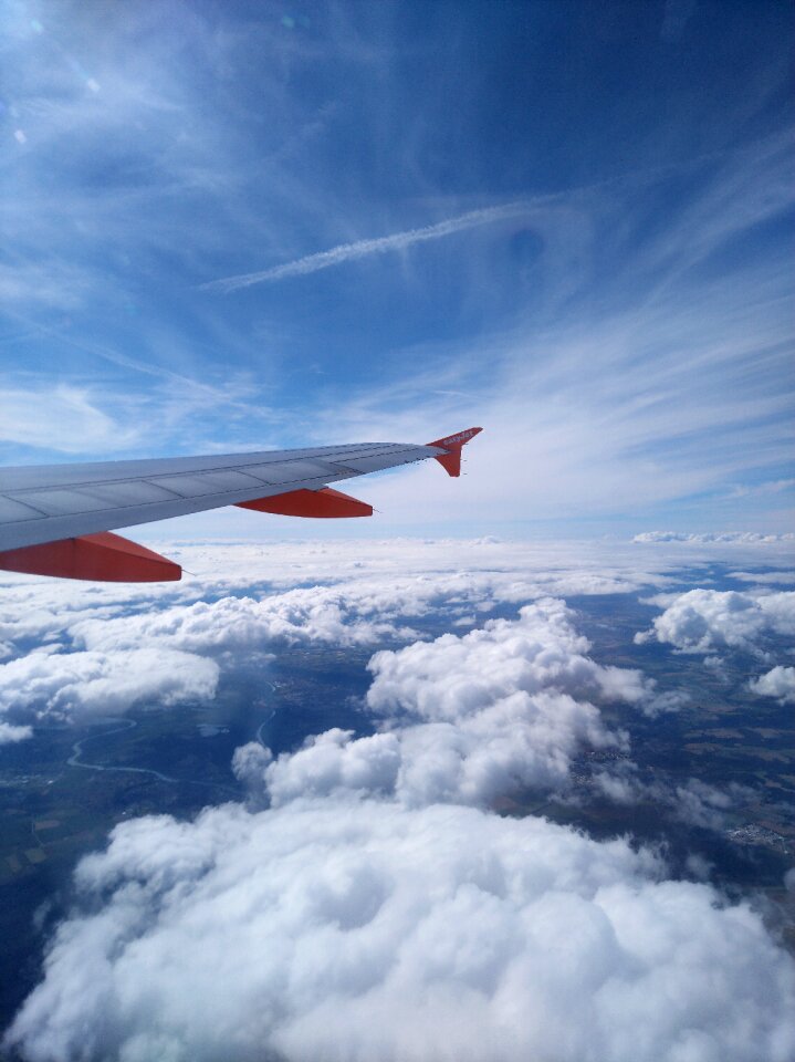 Plane clouds sky