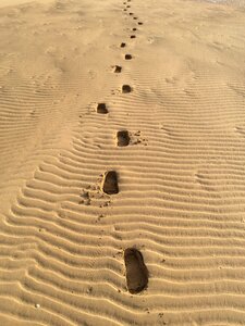 Sandy footprints sand photo