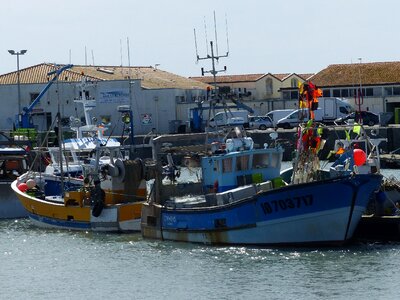 Fishing boats sea port photo