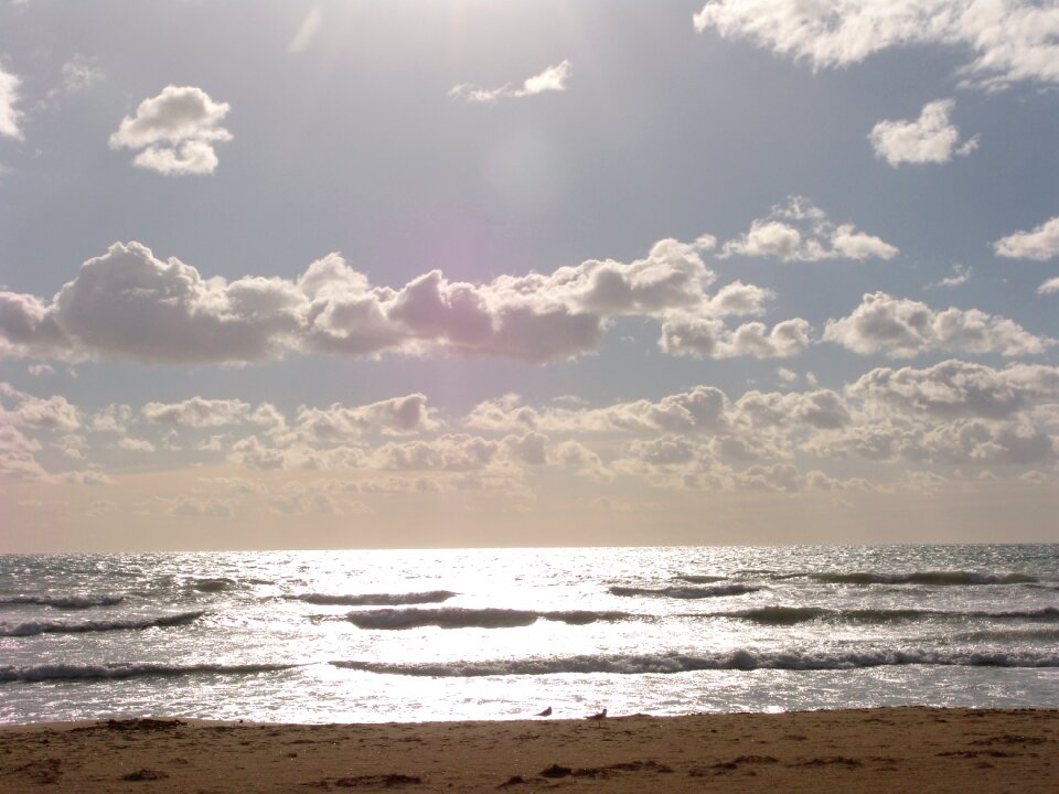 Clouds sky by the sea photo