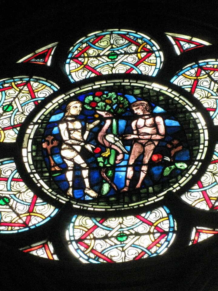 Stained glass adam and eve garden of eden