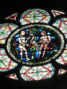 Stained glass adam and eve garden of eden