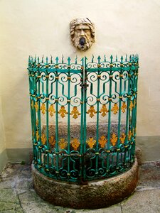 Wall fountain wrought iron decorative fence ancient photo