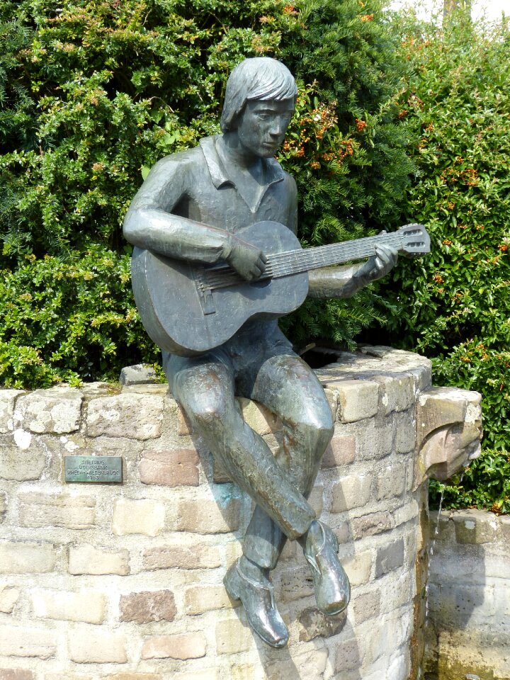 Play guitar stringed instrument figure
