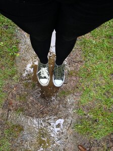 Shoes muddy dirt photo