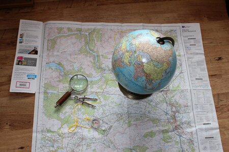 Compass magnifying glass orienteering photo