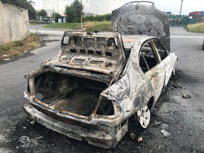 Vehicle burned out fire damage photo