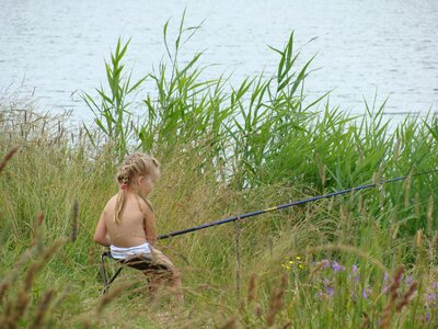 Beach reed fishing photo