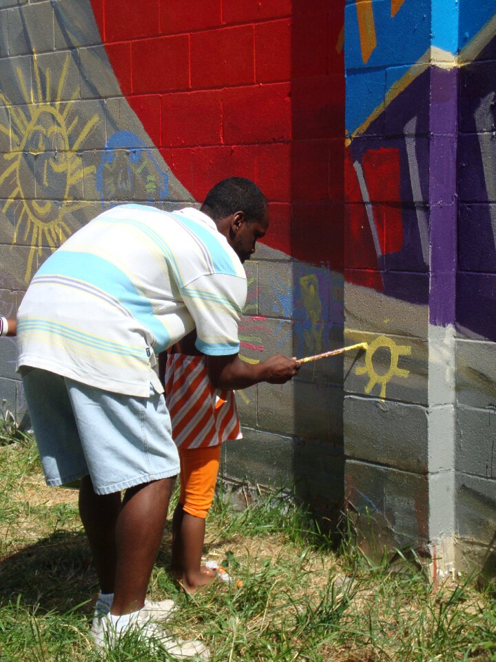 Kids paint neighborhood