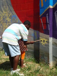 Kids paint neighborhood
