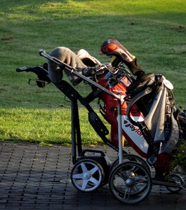 Golf carts golf clubs golfer