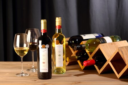 Glass of wine wine bottles drink photo
