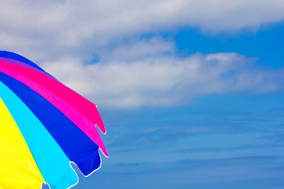 Clouds colorful blue umbrella