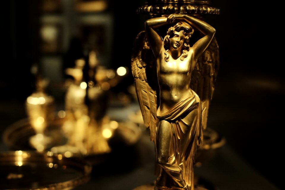 Gold people sculpture art